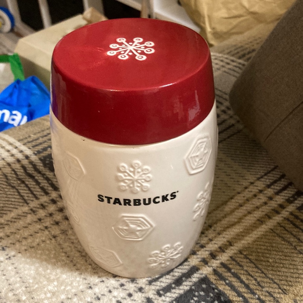 Starbucks Coffee jar white with red lid with snowflakes on